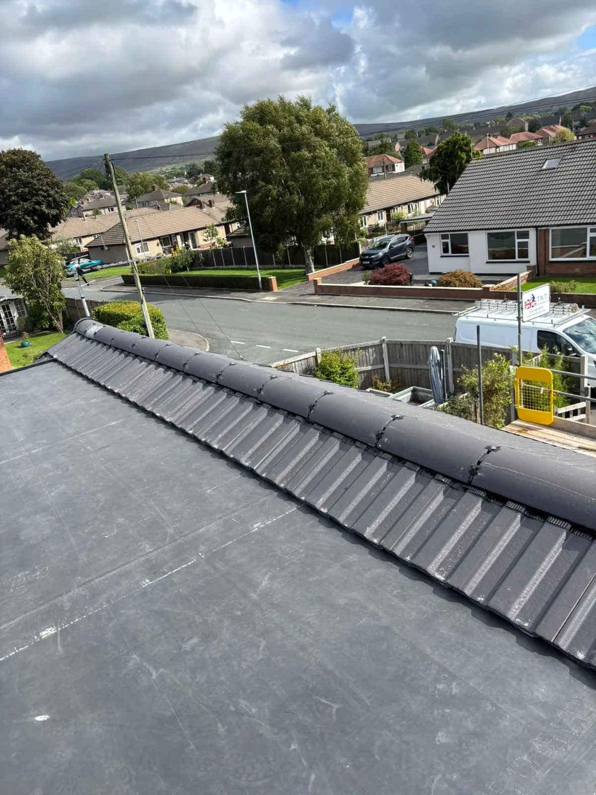 Ridge tiles and flat roof